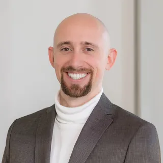 Porträtfoto von Valentin Döring, Externer Berater Qualitätsmanagement bei memozero